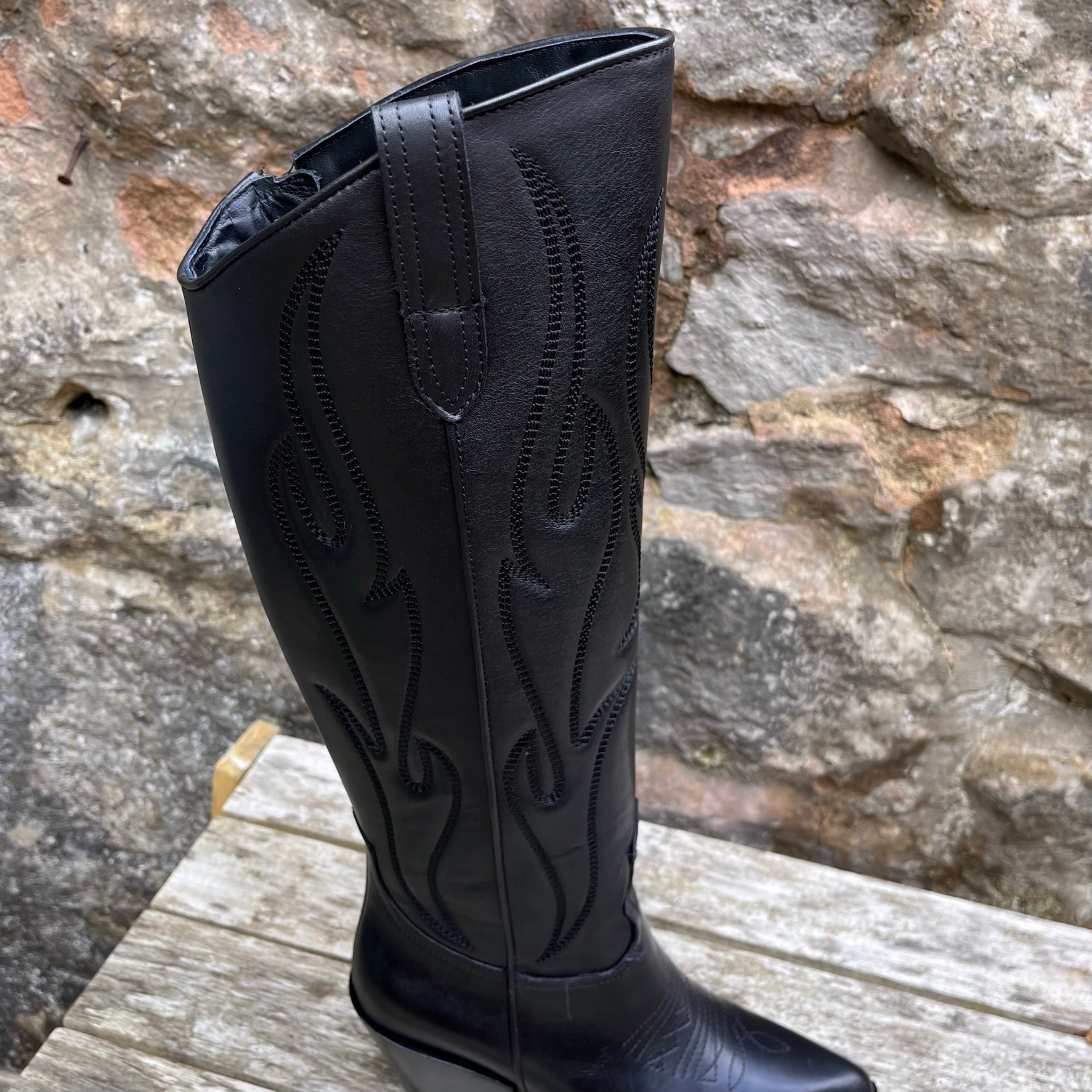 Long black cowboy top boots