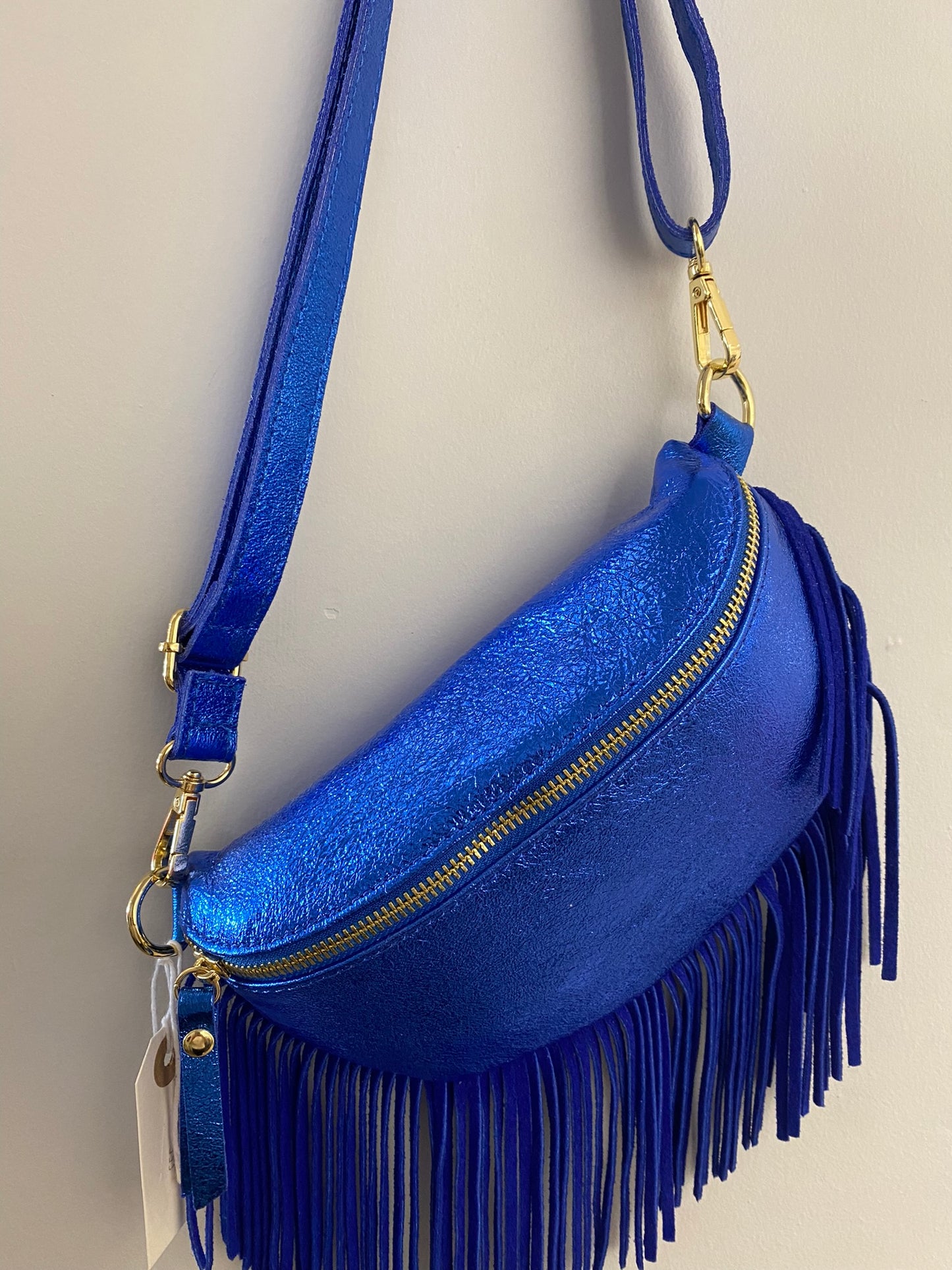 Italian Leather Half Moon Crossbody Bag with Fringed Trim in Metallic Blue